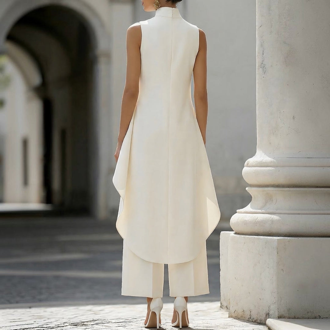 Victoria · Mono largo de caída fluida y elegante